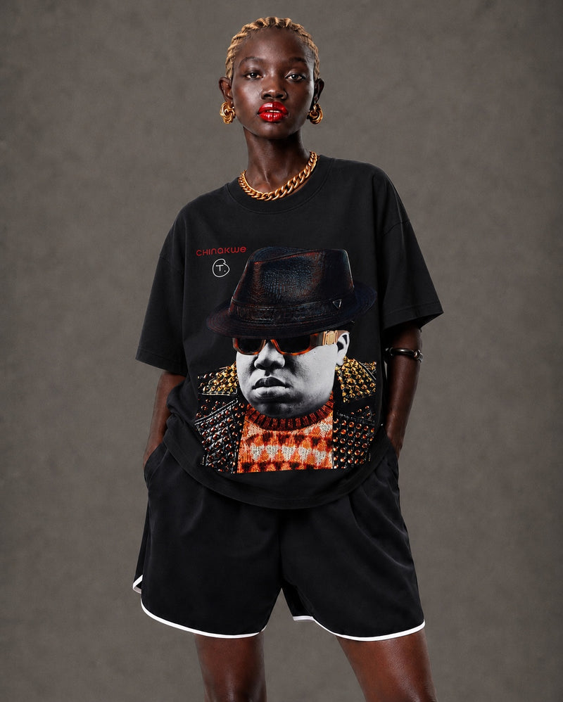 Female model wearing CHINAKWE BIG black T-shirt