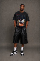 Male model wearing CHINAKWE BIG black T-shirt