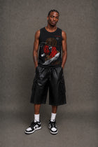 Male model wearing CHINAKWE BUSTA black tank top