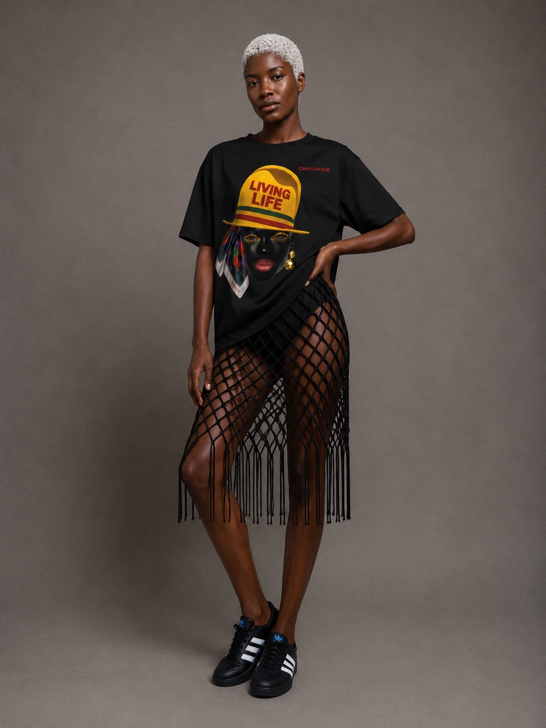Female model wearing CHINAKWE Live Life Yellow black T-shirt