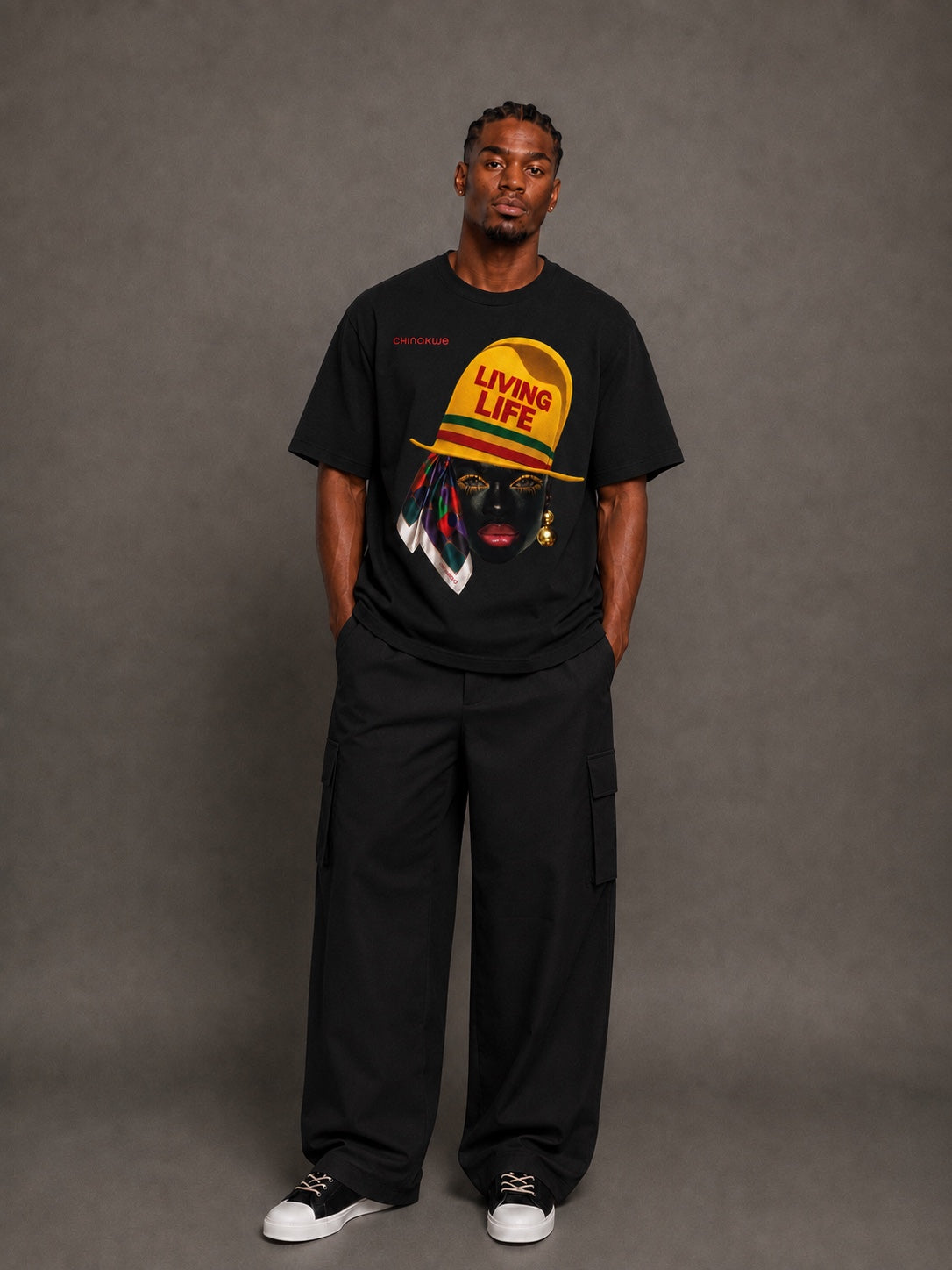 Male model wearing CHINAKWE Live Life Yellow black T-shirt