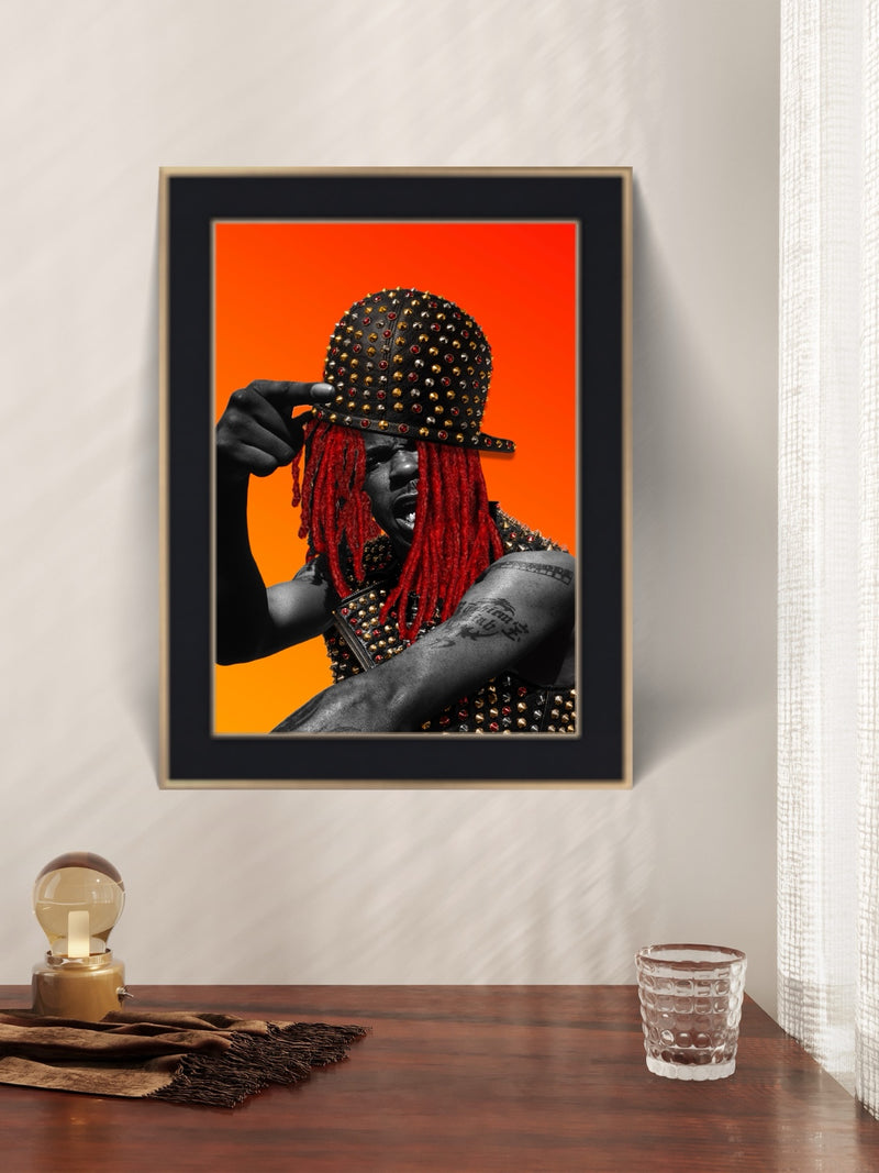 BUSTA framed artwork displayed in a light tabletop interior